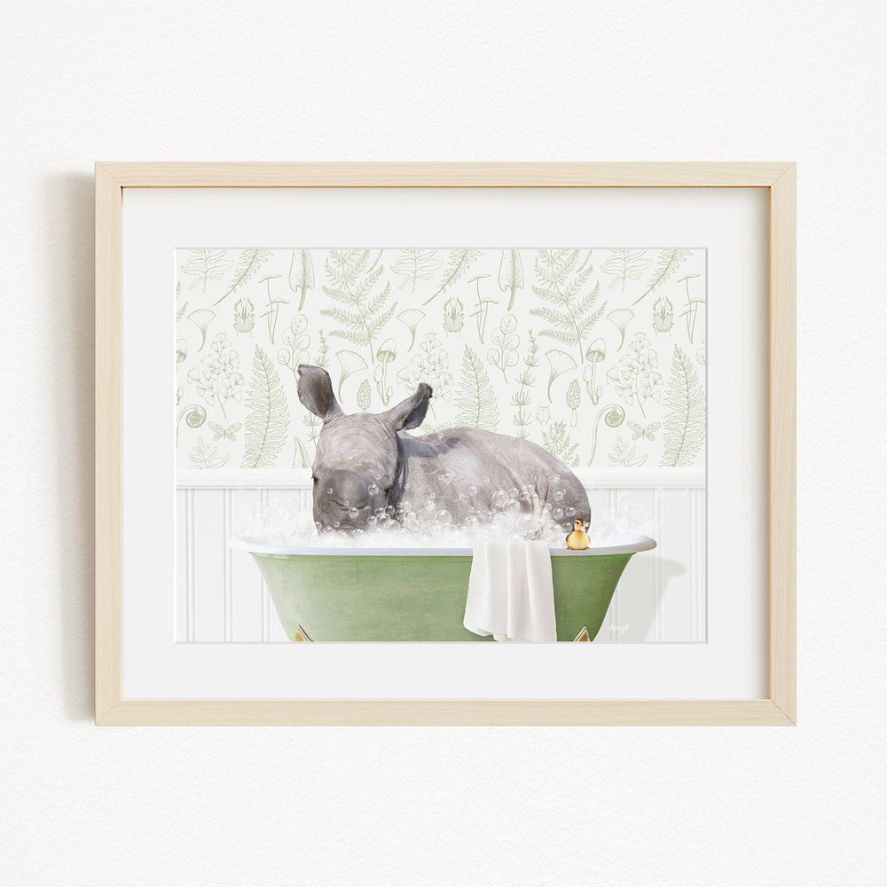 A rhinoceros is sitting in a green bathtub filled with water, surrounded by a patterned wall.