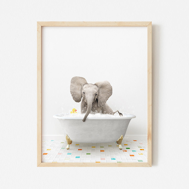 an elephant taking a bath in a bathtub