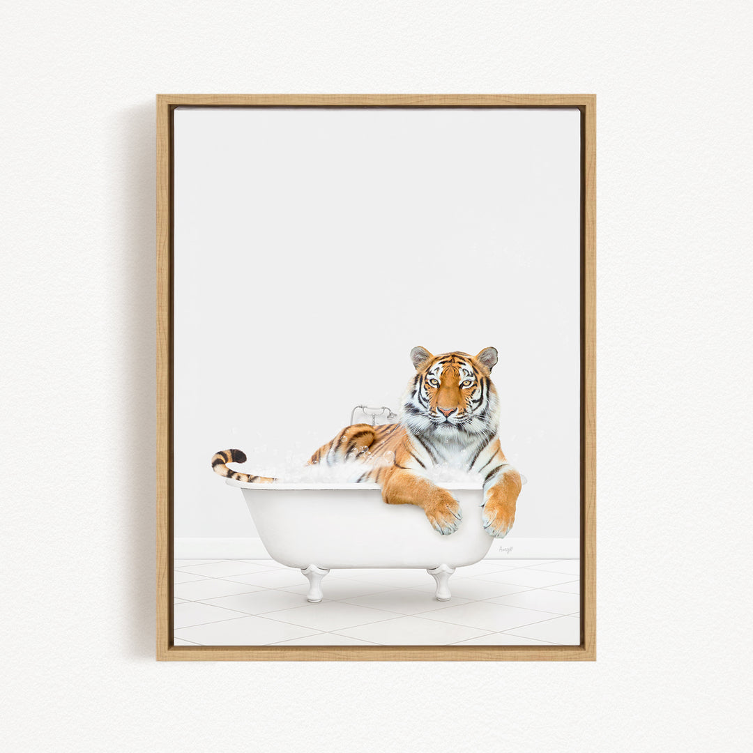 A tiger is sitting in a white bathtub, appearing relaxed and enjoying the bath.