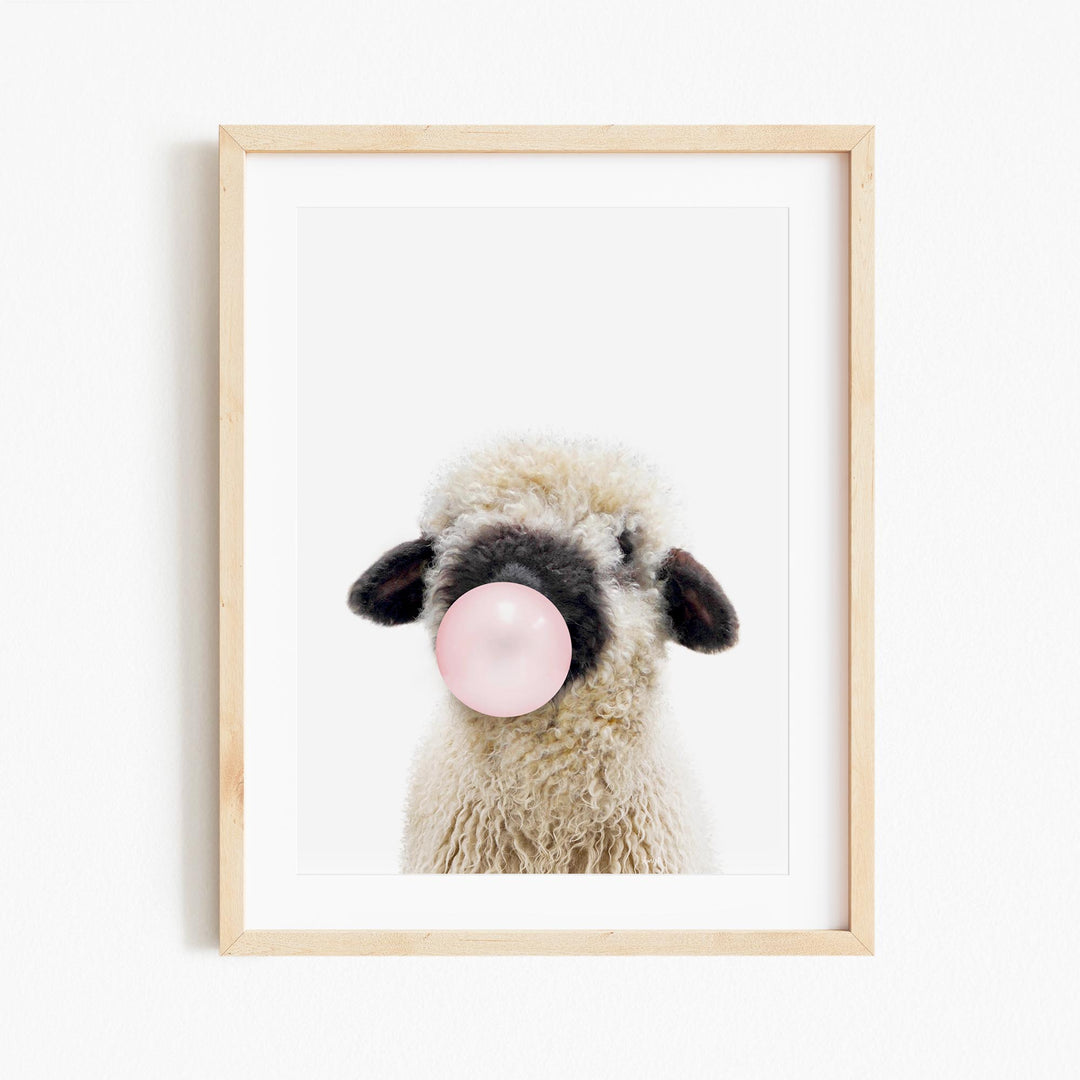 a picture of a sheep with a bubble in its mouth