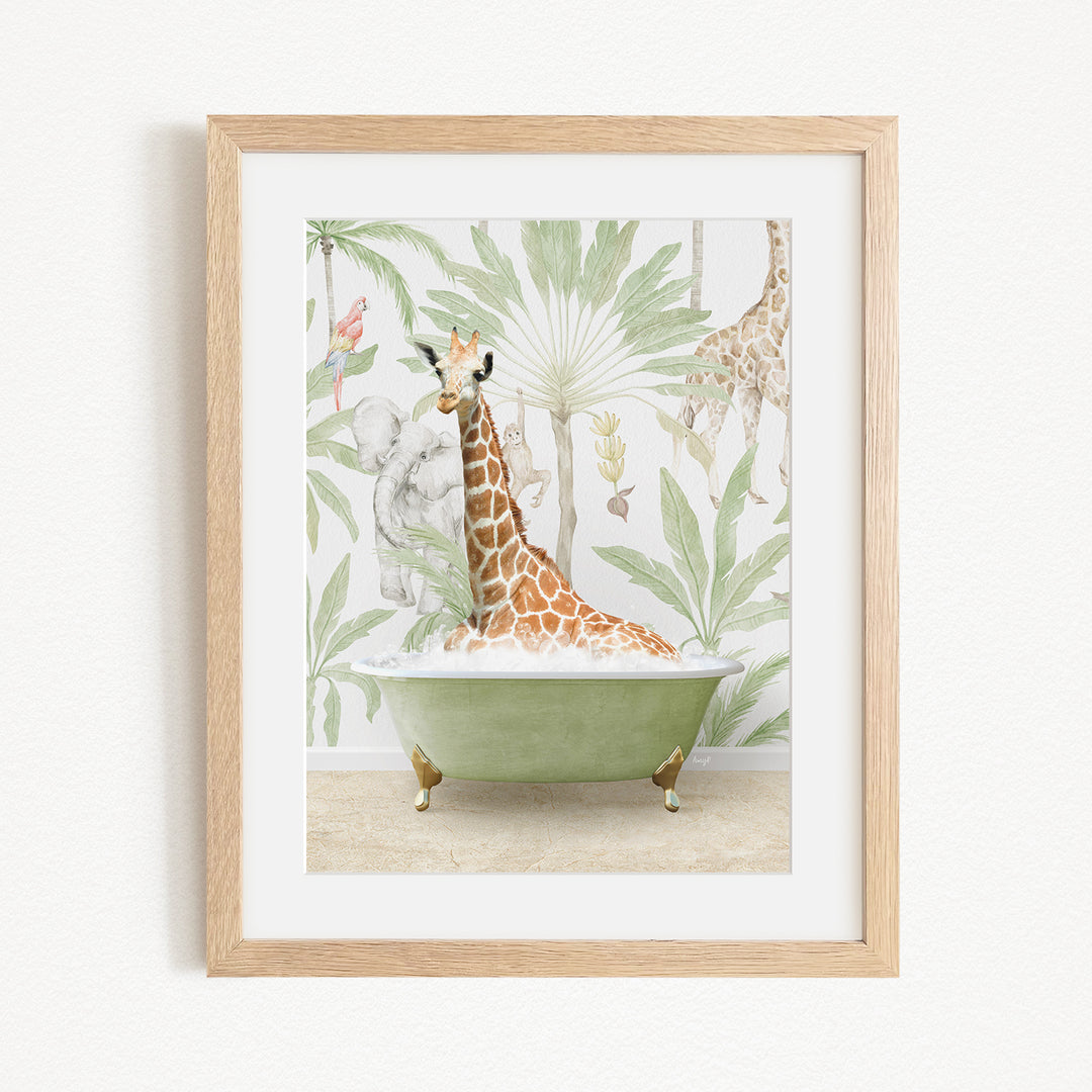 A giraffe sitting in a green bathtub, surrounded by tropical foliage, is the central focus of the framed artwork.