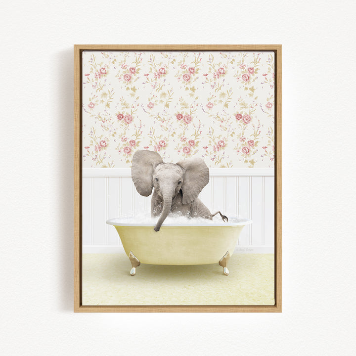 A baby elephant sitting in a bathtub filled with water, surrounded by a floral wallpaper.