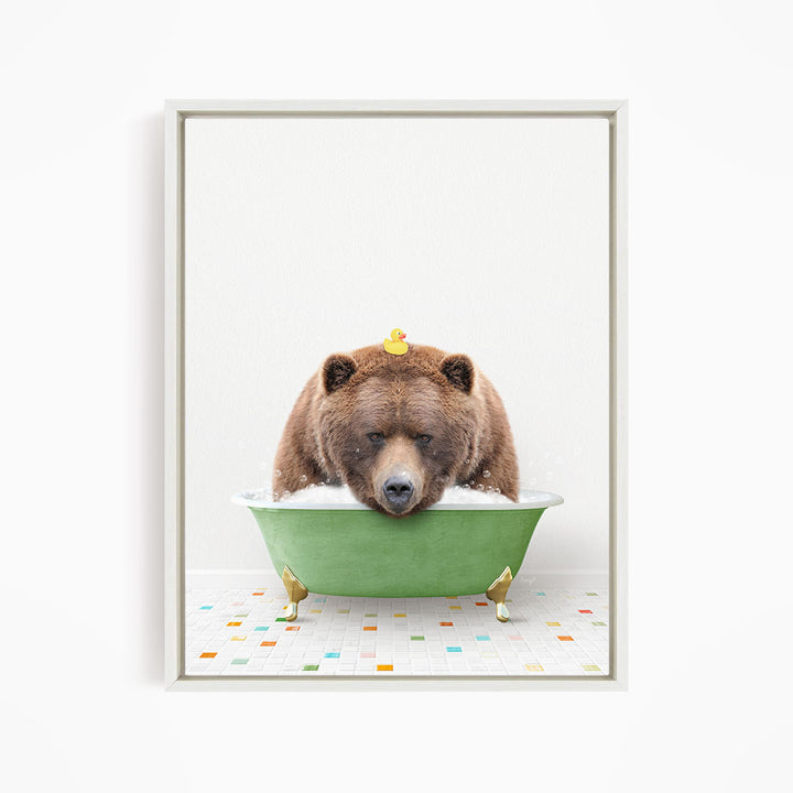 A brown bear is sitting in a green bathtub, surrounded by rubber ducks.