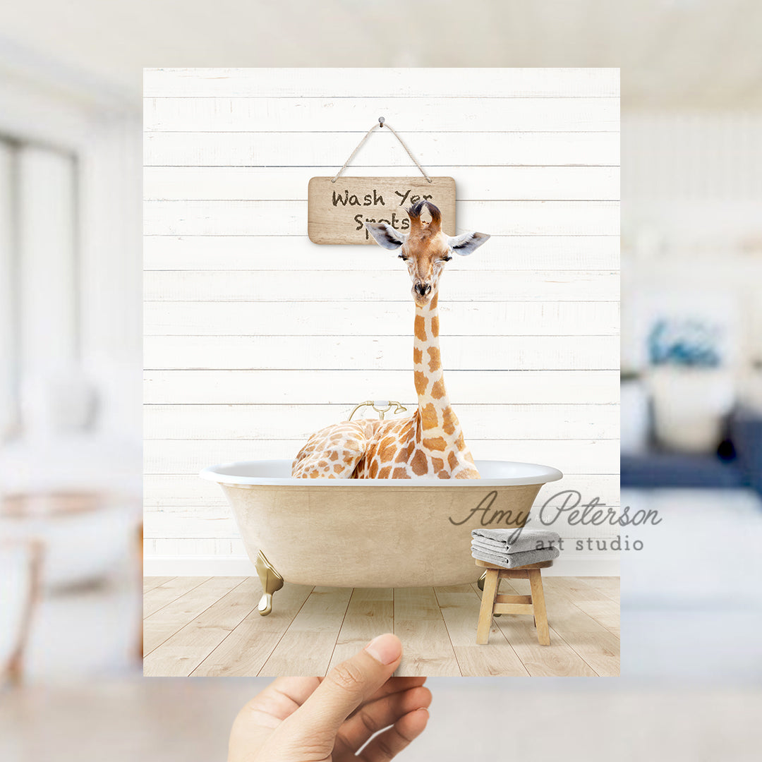 a giraffe in a bathtub with a sign hanging from it's