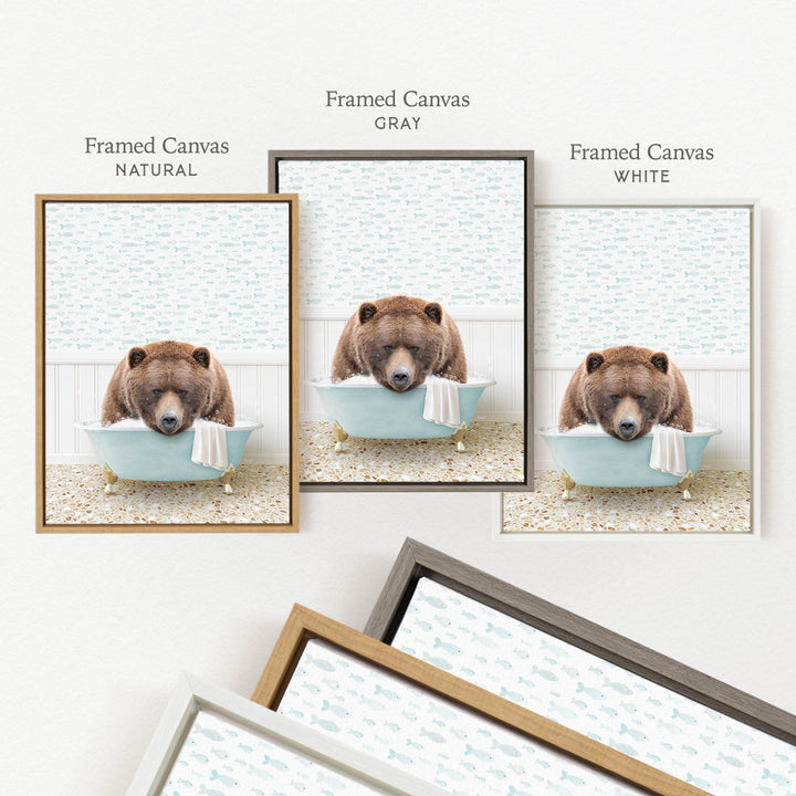three framed pictures of a bear sitting in a bathtub, each with a different colored frame.