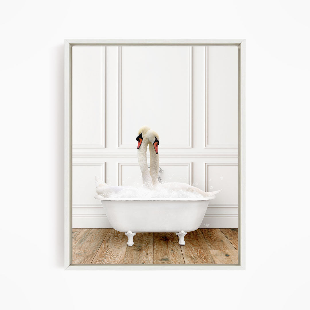 A white swan is sitting in a white bathtub filled with bubbles, with its head and neck raised above the water.