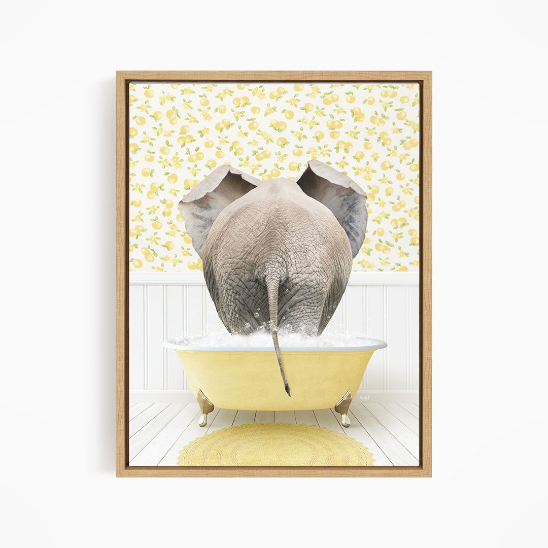 A gray elephant is sitting in a yellow bathtub filled with water, surrounded by a yellow floral pattern on the wall behind it.