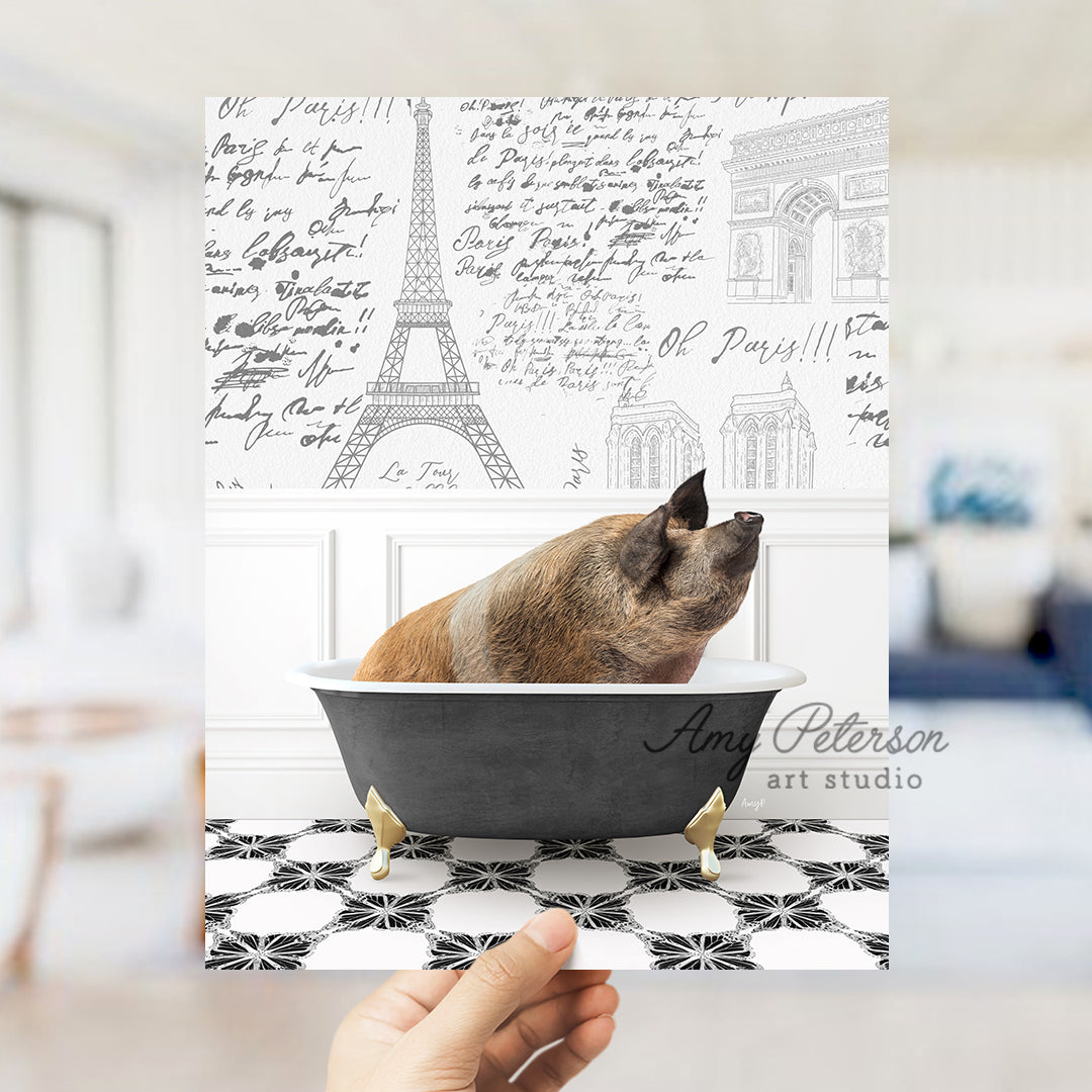 a dog sitting in a bathtub with the eiffel tower in the background