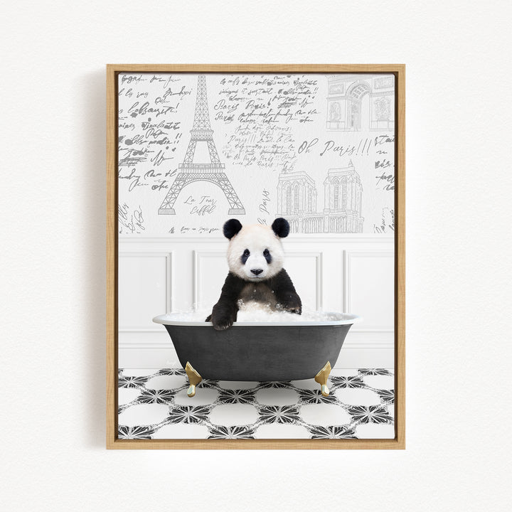 A panda bear sitting in a bathtub, surrounded by a black and white patterned floor and a wall with the Eiffel Tower and other Parisian landmarks.