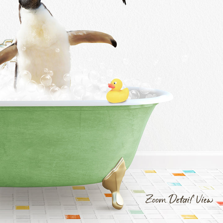 A penguin standing in a green bathtub filled with bubbles, with a yellow rubber duck floating on the water.