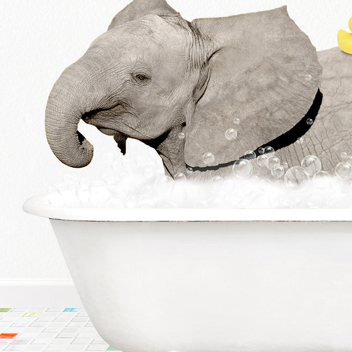 an elephant taking a bath in a bathtub