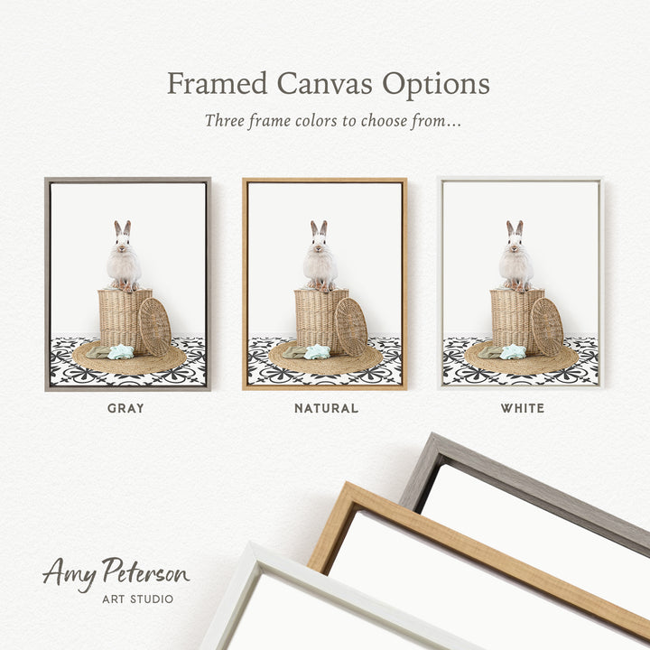 three framed canvas options, each featuring a white rabbit sitting on a basket. The options include a gray frame, a natural frame, and a white frame.