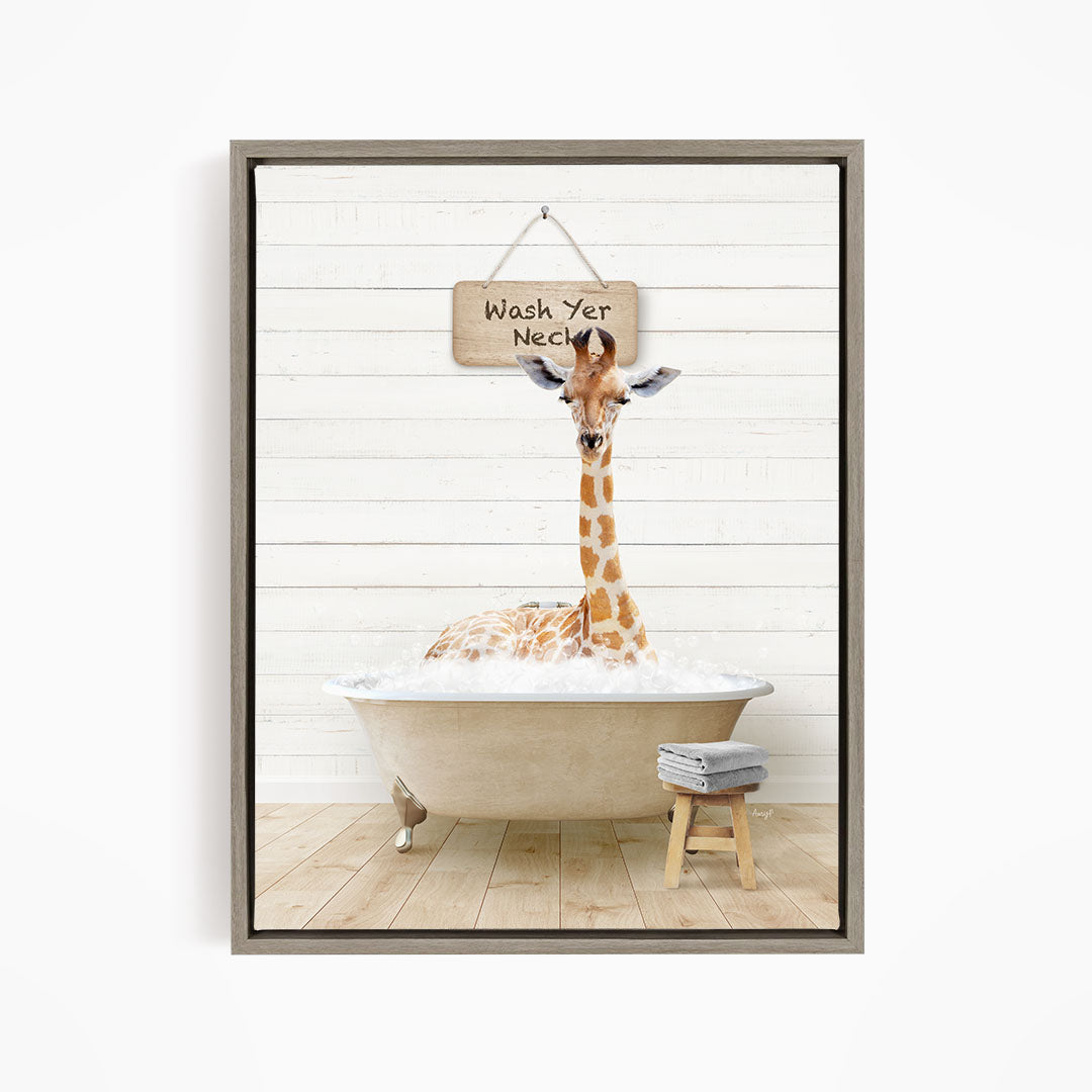 A giraffe sitting in a bathtub with a sign that says "Wash Yer Neck" hanging above it.