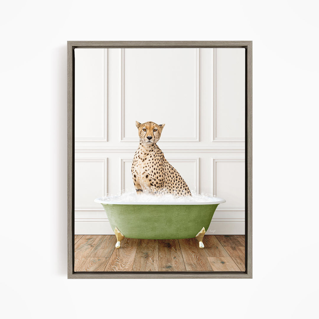 A cheetah sitting in a green bathtub filled with water, with a white wall and wooden floor in the background.