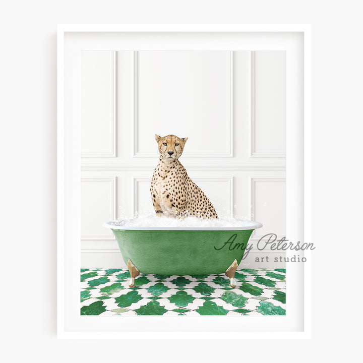 a cheetah sitting in a green bath tub