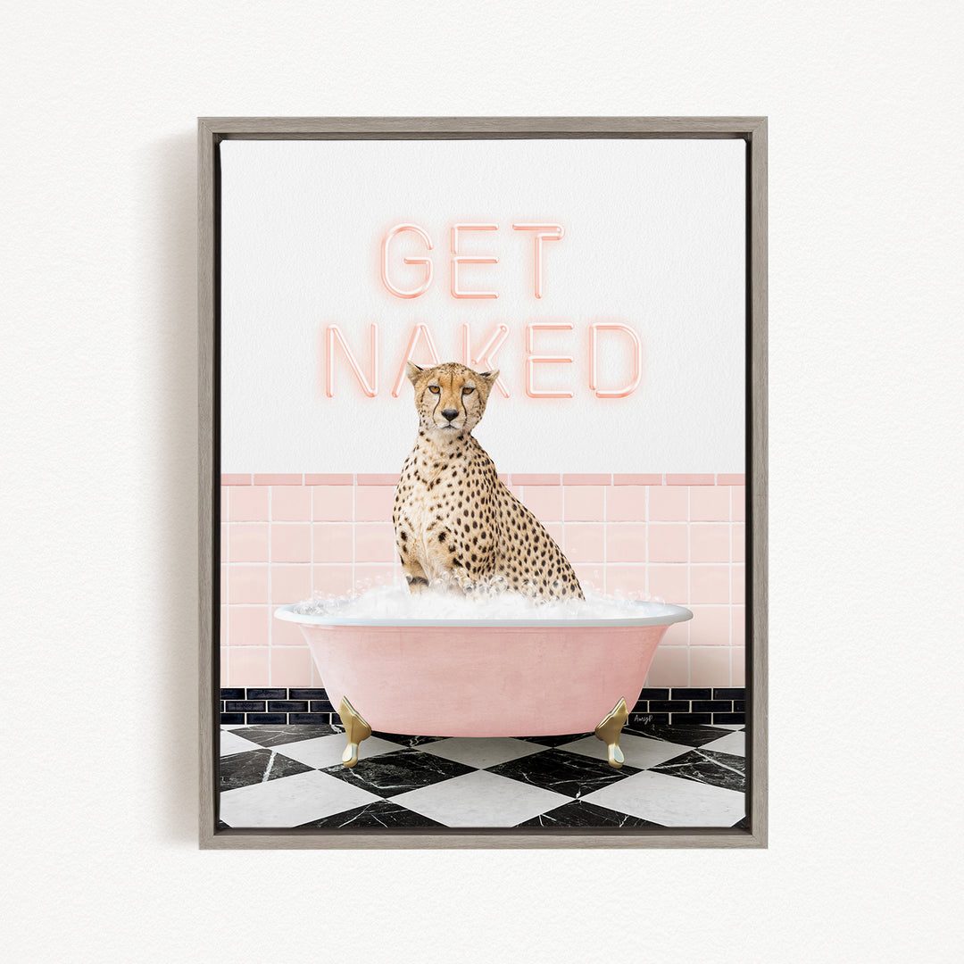 A cheetah sitting in a pink bathtub with the text "GET NAKED" displayed above it.