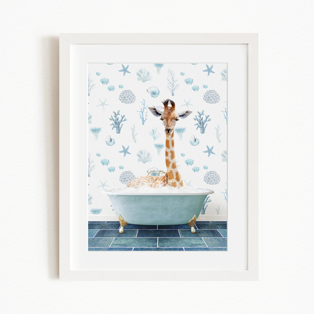 A giraffe is sitting in a bathtub filled with bubbles, surrounded by a blue and white ocean-themed wallpaper.