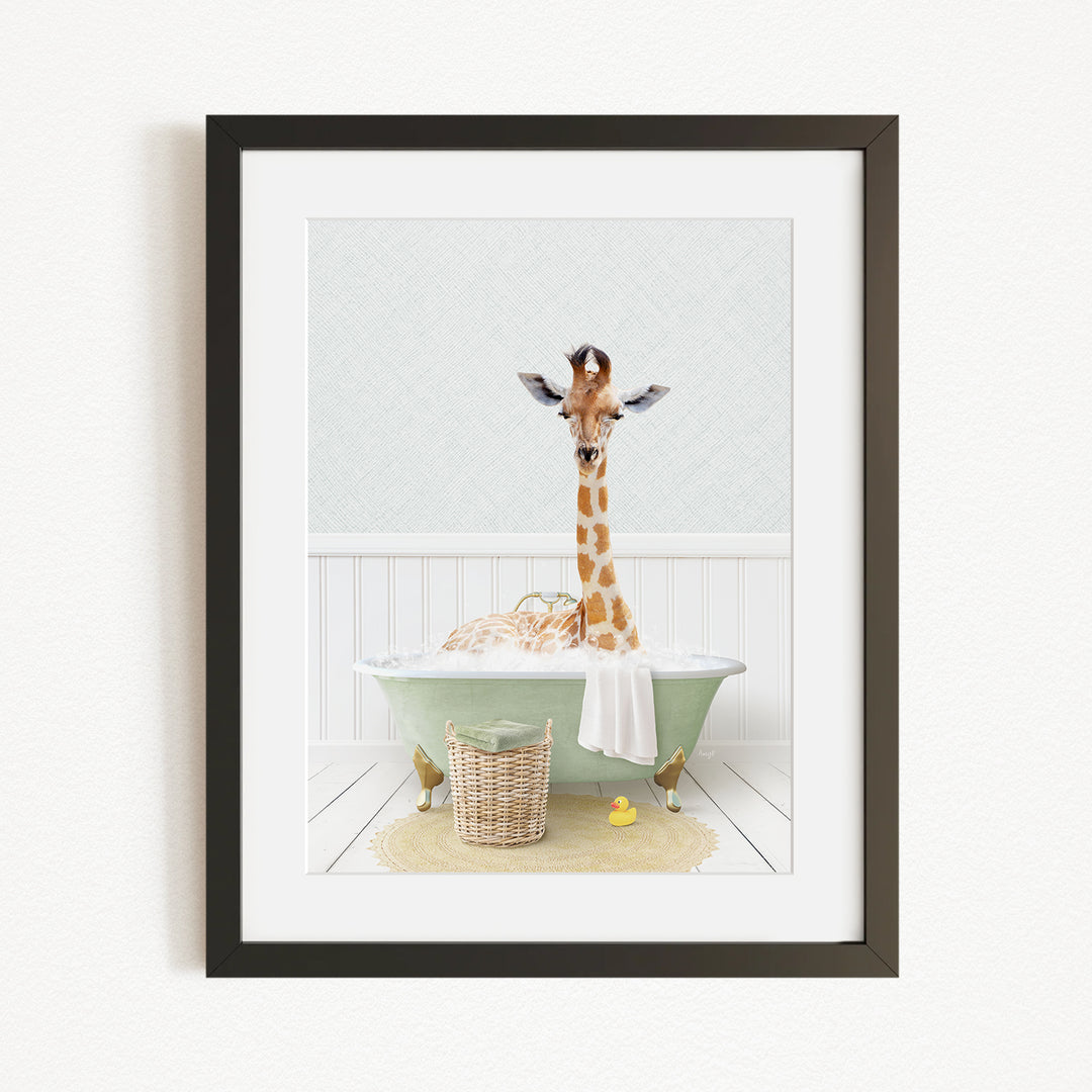 A giraffe standing in a green bathtub filled with bubbles, surrounded by a basket of toys and a yellow rubber duck.