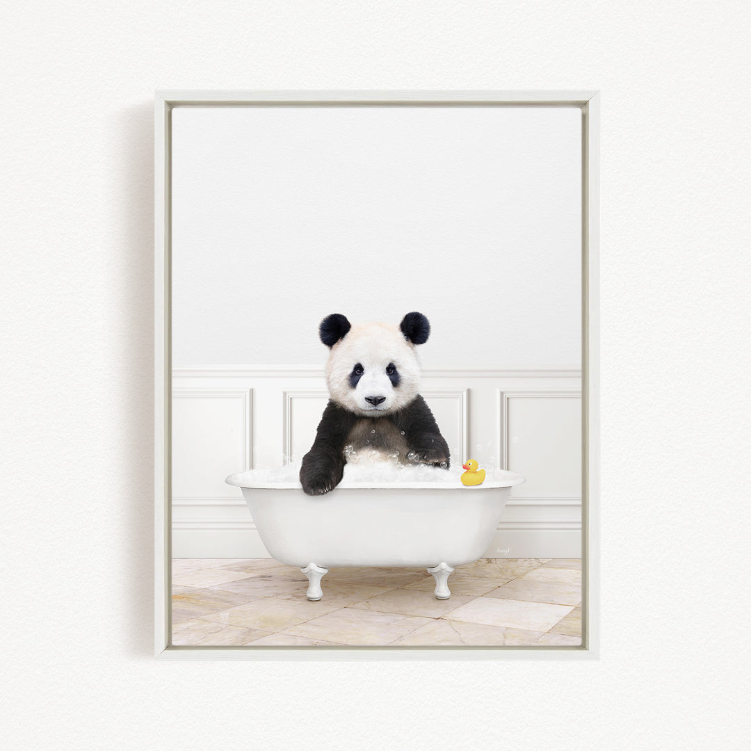 A panda bear sitting in a white bathtub, surrounded by a white wall and a yellow rubber duck.