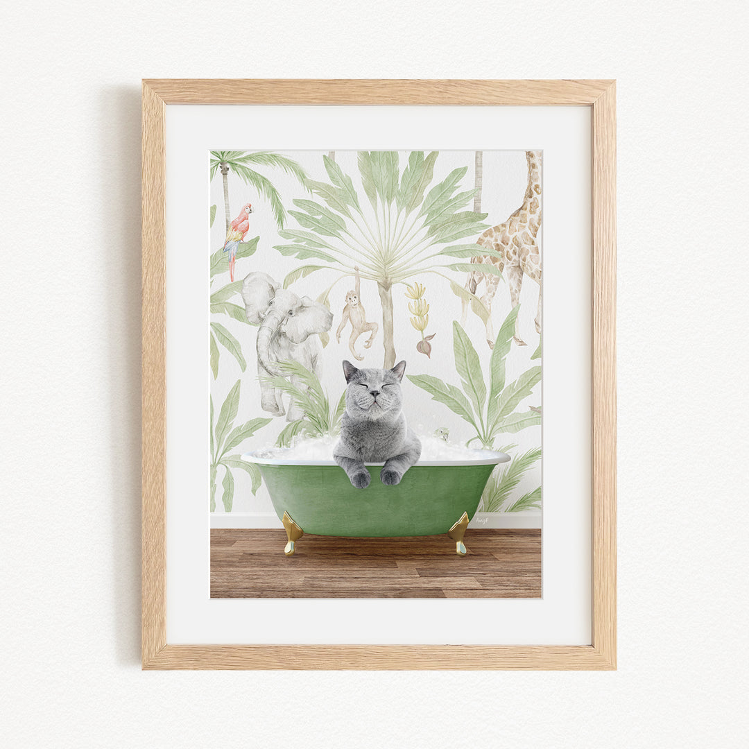 A framed illustration depicting a gray cat sitting in a green bathtub, surrounded by a tropical jungle scene with various animals and plants.
