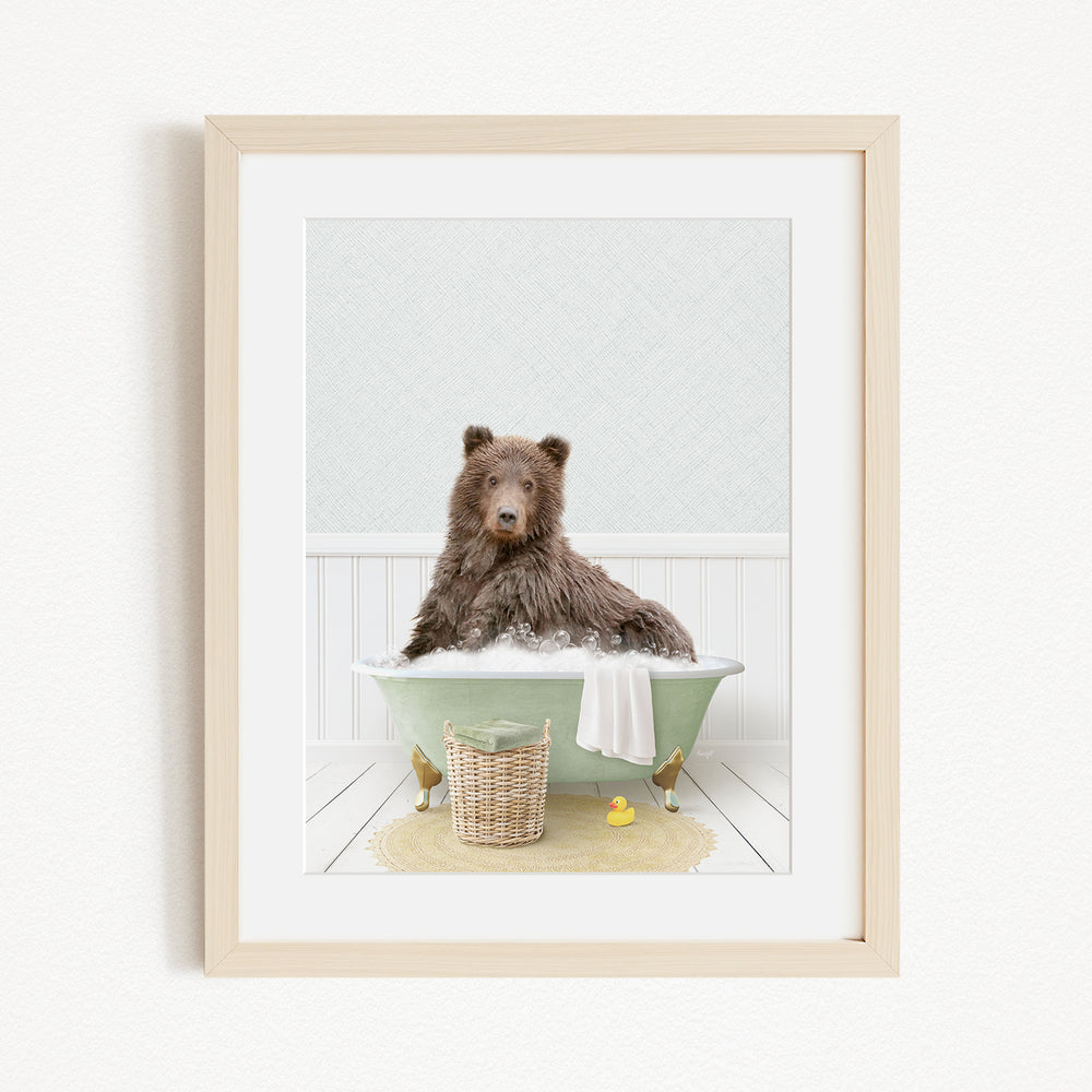 A brown bear sitting in a green bathtub filled with water, surrounded by rubber ducks and a basket.