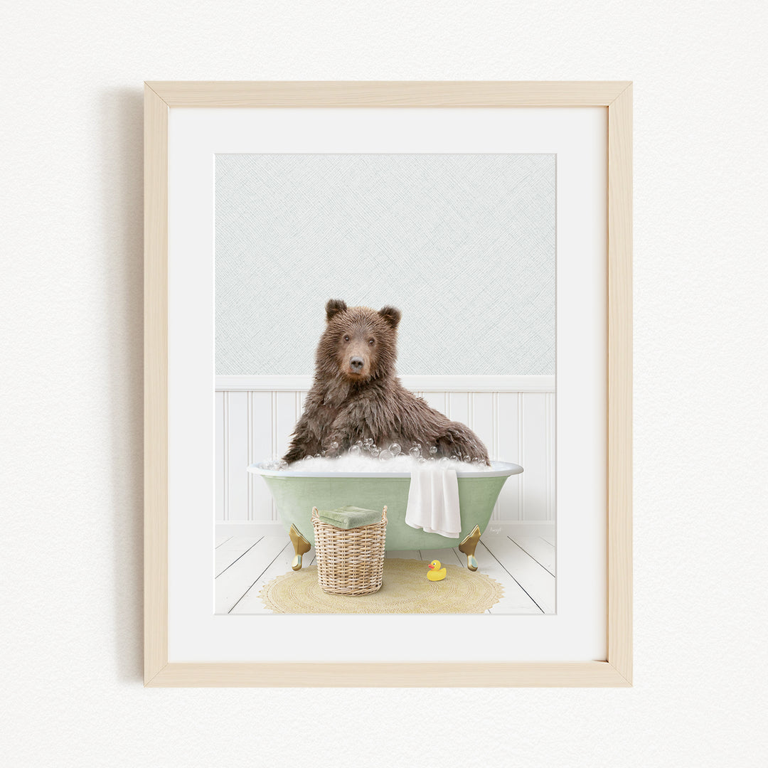 A brown bear sitting in a green bathtub filled with water, surrounded by rubber ducks and a basket.