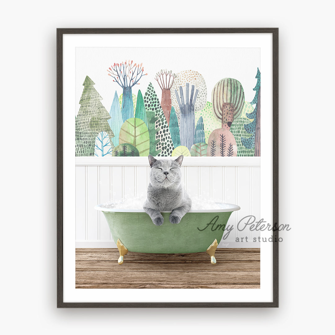 a gray cat sitting in a green bath tub