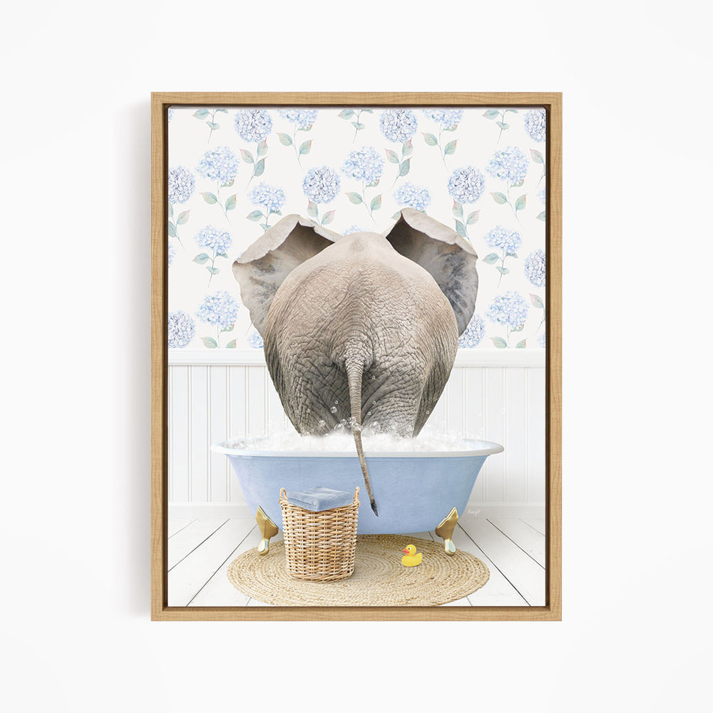 An elephant is taking a bath in a blue tub, surrounded by a wicker basket, rubber ducks, and a floral patterned wall.