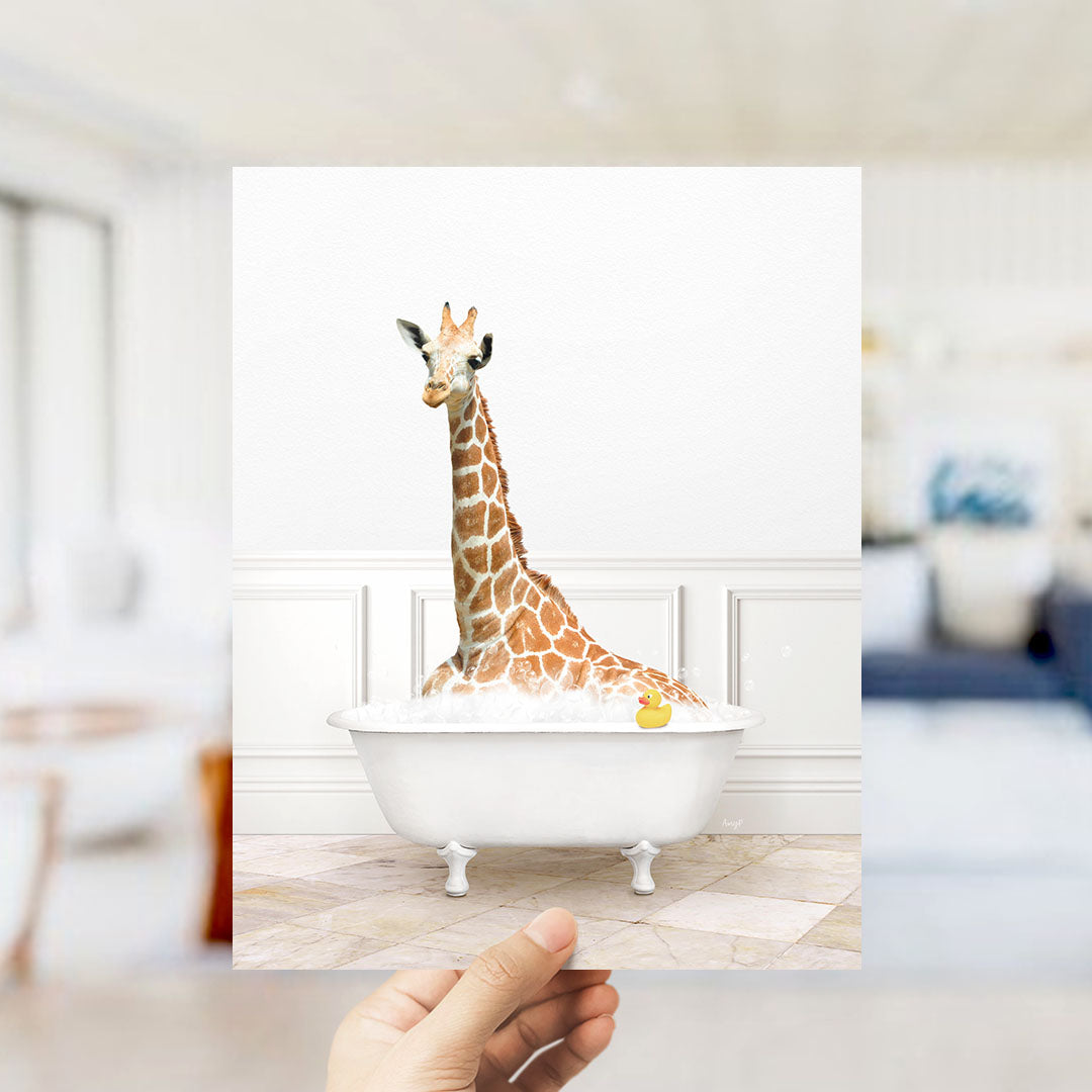 A giraffe sitting in a bathtub filled with water and a rubber duck floating in the water.