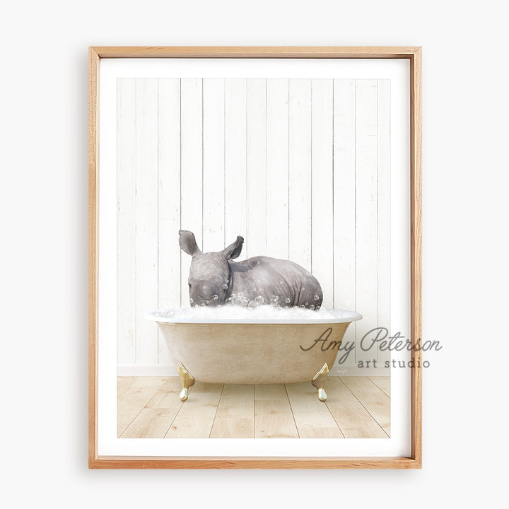 a rhino laying in a bathtub with a wooden frame