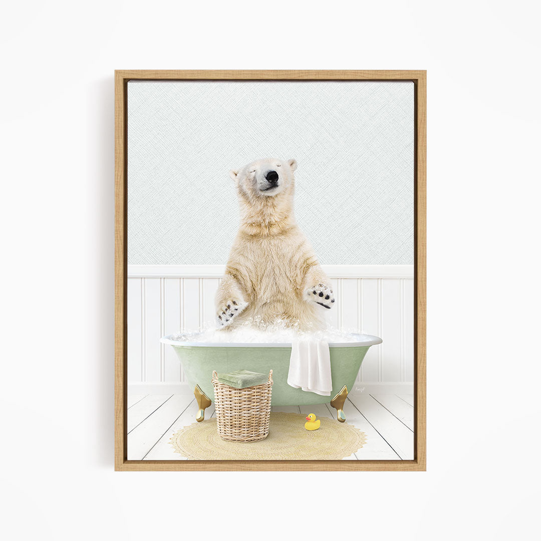 A polar bear sitting in a green bathtub filled with bubbles, surrounded by a basket of toys and a rubber duck.