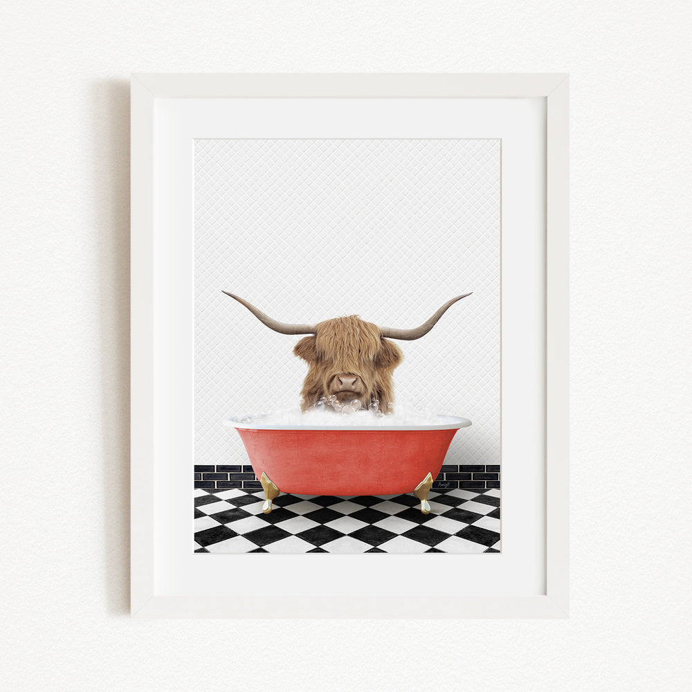A Highland cow with long horns is sitting in a red bathtub, surrounded by a black and white checkered floor.