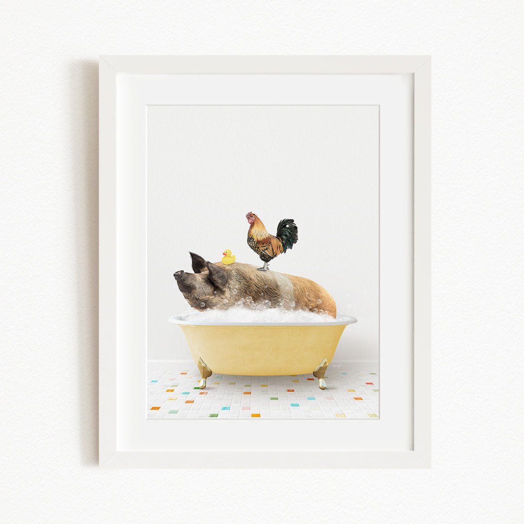 A framed image depicting a pig sitting in a yellow bathtub, with a rooster perched on its head, and a yellow rubber duck floating on the water.