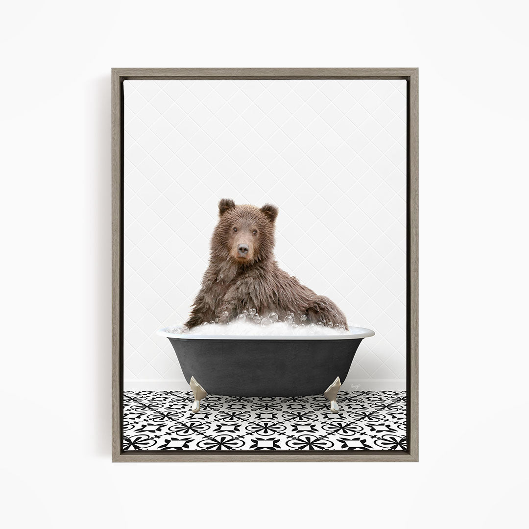 A brown bear sitting in a bathtub filled with water, surrounded by a black and white patterned floor.
