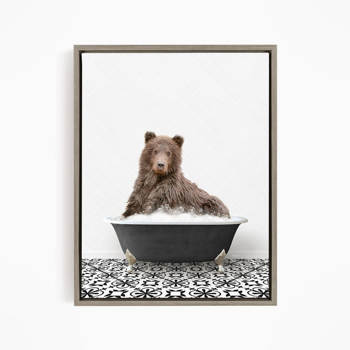 A brown bear sitting in a bathtub filled with water, surrounded by a black and white patterned floor.