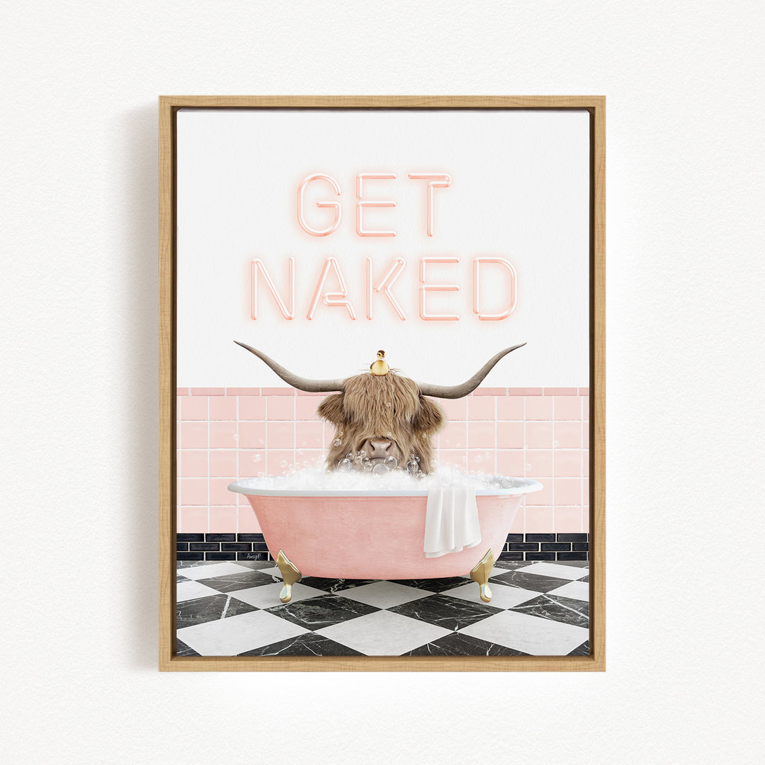 A framed image depicting a horned animal, possibly a yak or a cow, sitting in a pink bathtub filled with bubbles, with the text "GET NAKED" displayed above it.