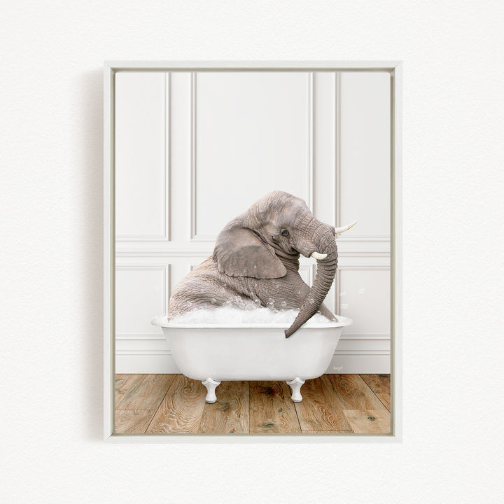 A gray elephant sitting in a white bathtub filled with water, creating a whimsical and playful scene.