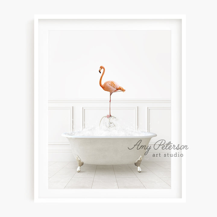 a pink flamingo standing on top of a bath tub