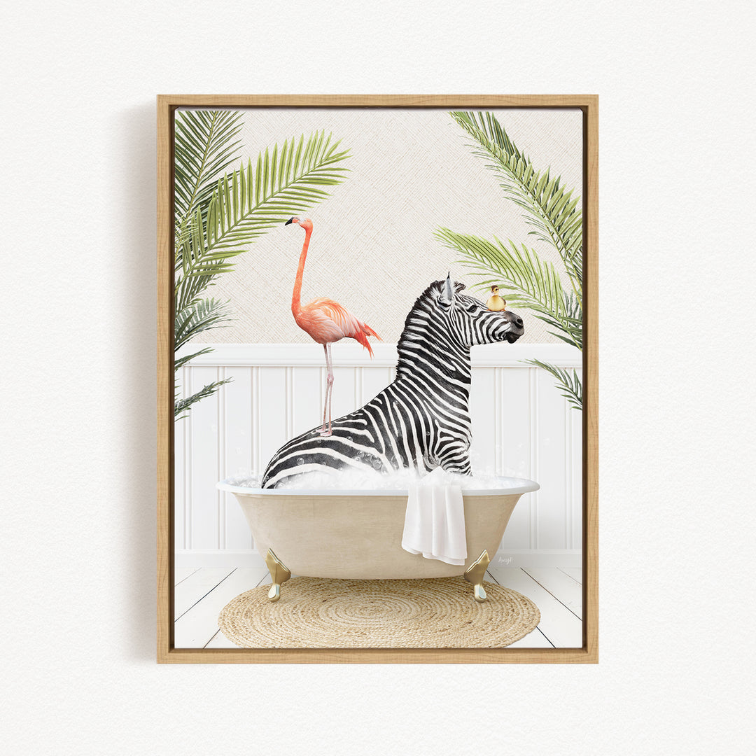 A framed image depicting a zebra sitting in a bathtub, with a pink flamingo standing on its back and a palm tree nearby.