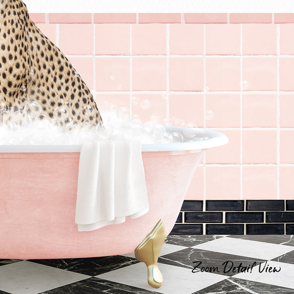 A leopard sitting in a pink bathtub filled with bubbles, with a towel hanging on the side and a checkered floor in the background.