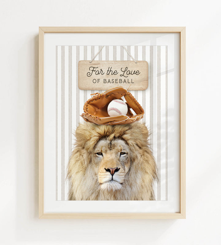 A framed image of a lion wearing a baseball glove and holding a baseball, with a sign above that says "For the Love of Baseball".