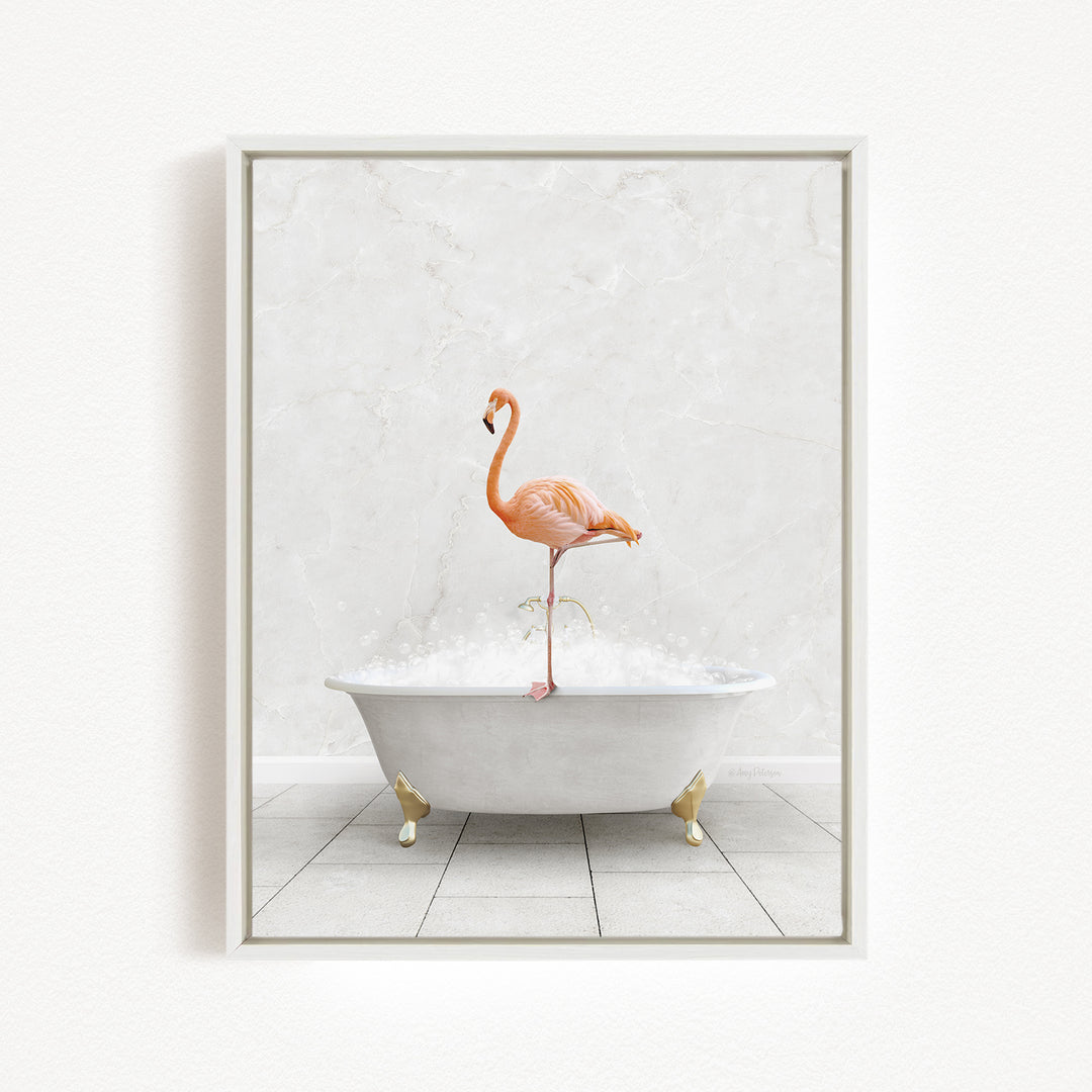 A pink flamingo standing on a white bathtub filled with bubbles, creating a whimsical and playful scene.