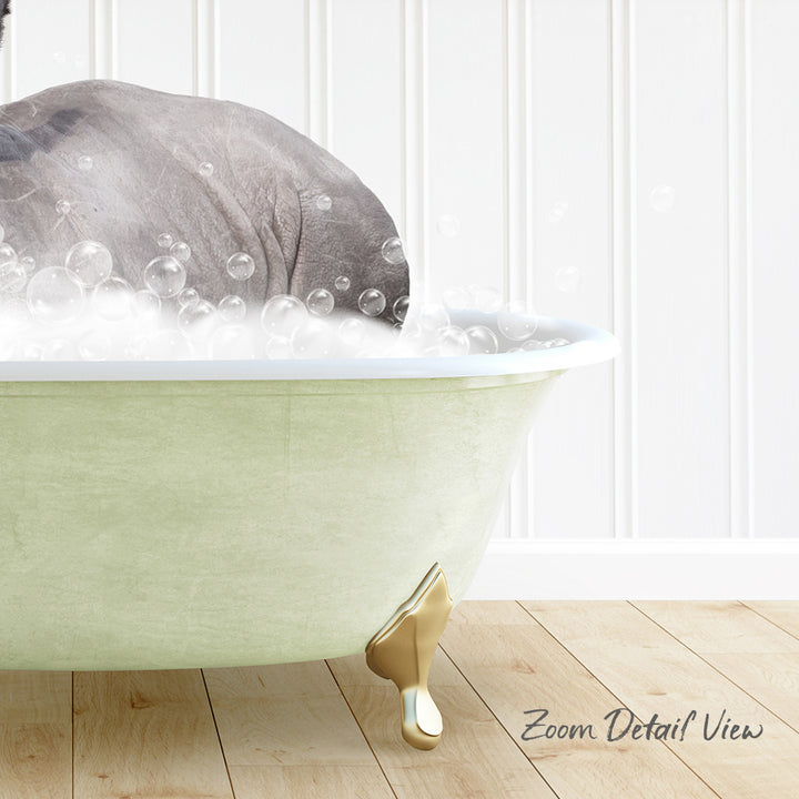 A large, green bathtub filled with soapy water, with a small animal, possibly a dog, sitting inside and enjoying a bath.