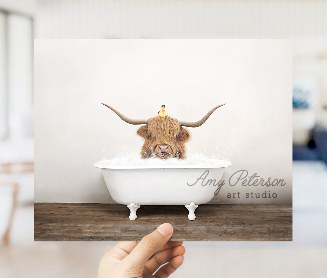 a person holding up a card with a picture of a bull in a bathtub