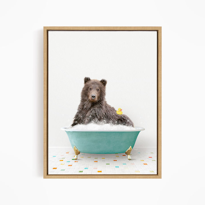 A brown bear sitting in a blue bathtub, with a yellow rubber duck floating on the water.