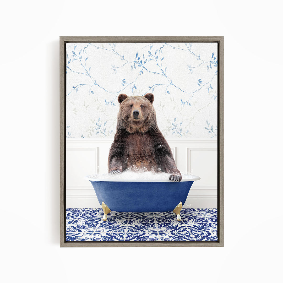A brown bear sitting in a blue bathtub filled with water, surrounded by a blue and white patterned floor.