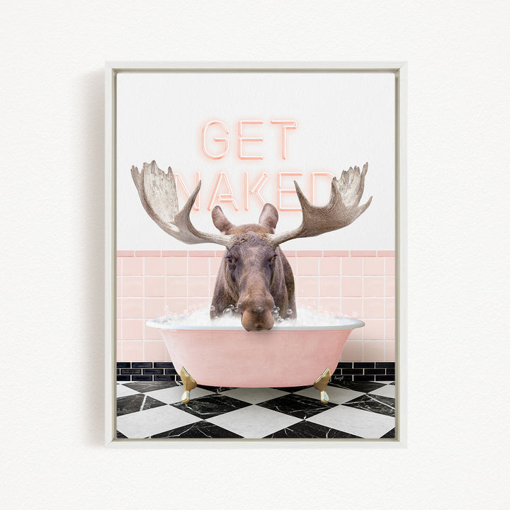 A moose is sitting in a pink bathtub, with the words "GET NAKED" written above it.