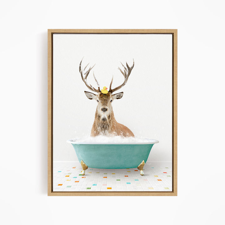 A deer with antlers is sitting in a blue bathtub filled with bubbles, with a yellow rubber duck perched on its head.