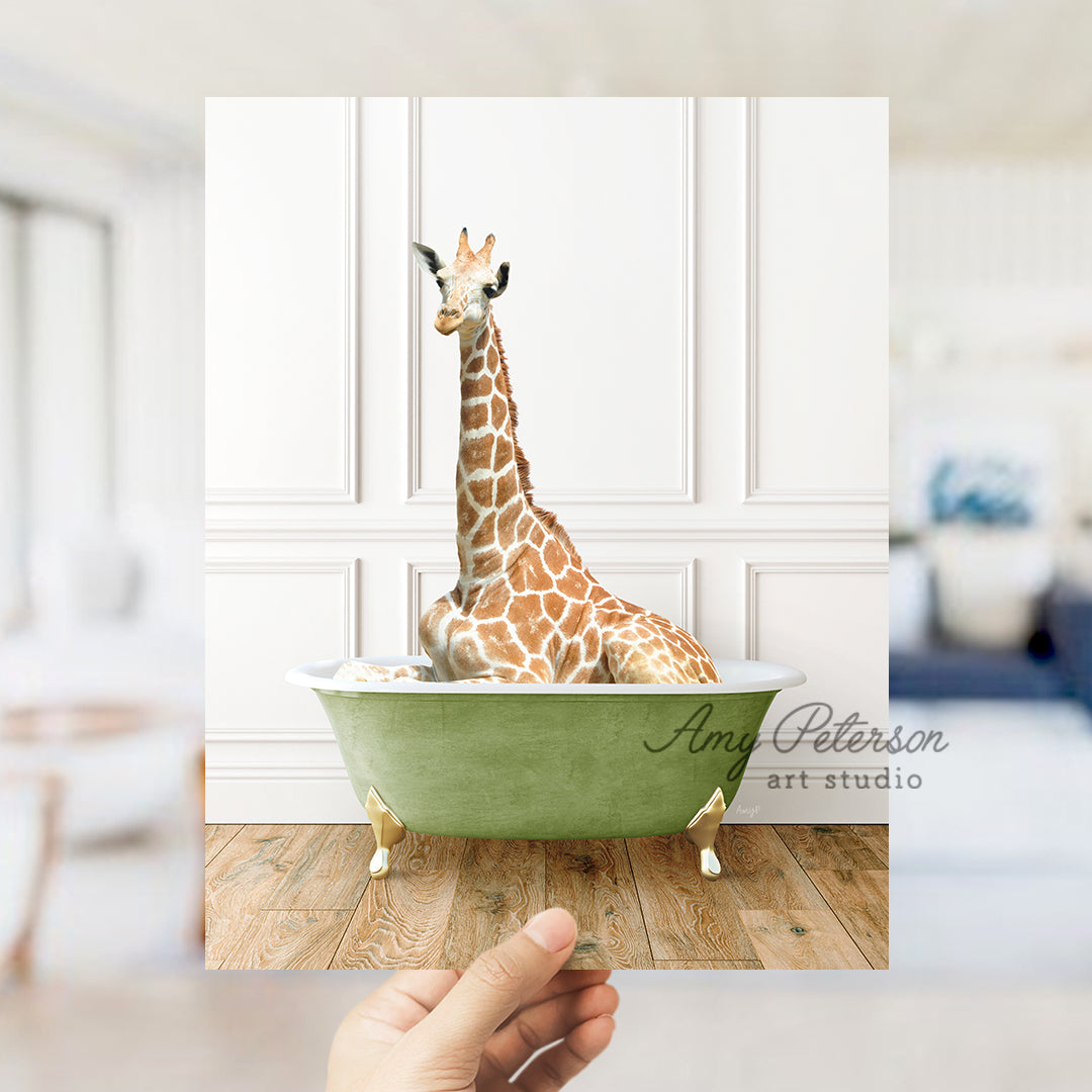 a giraffe sitting in a green bath tub