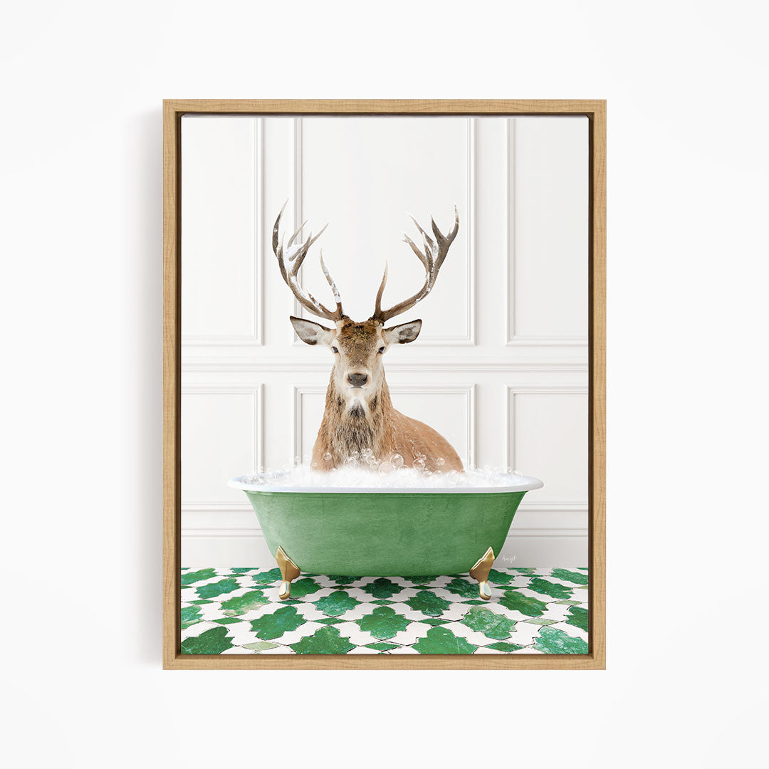 A deer with large antlers is sitting in a green bathtub filled with water, surrounded by a green and white patterned floor.